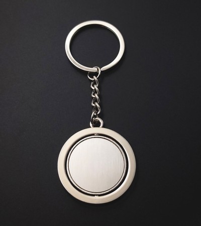 Round, rotating keychain